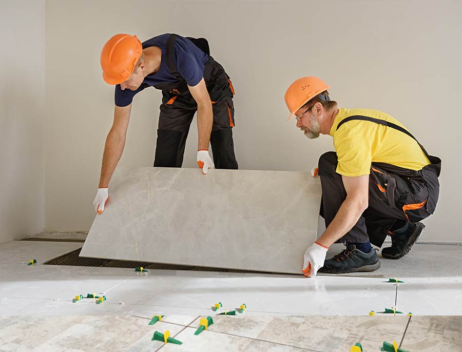 workers-are-installing-ceramic-tiles-floor_02